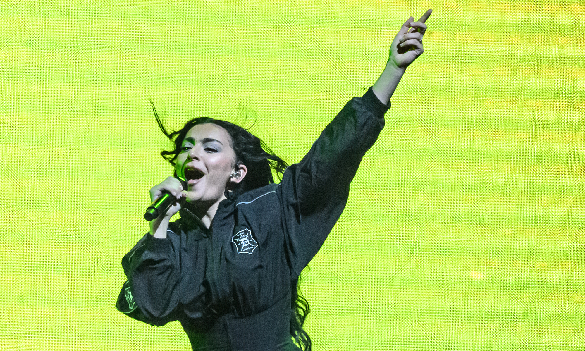 LONDON, ENGLAND - JUNE 27: Charli XCX joins Troye Sivan on stage during the Something to Give Each Other Tour at OVO Arena Wembley on June 27, 2024 in London, England. (Photo by Katja Ogrin/Redferns)