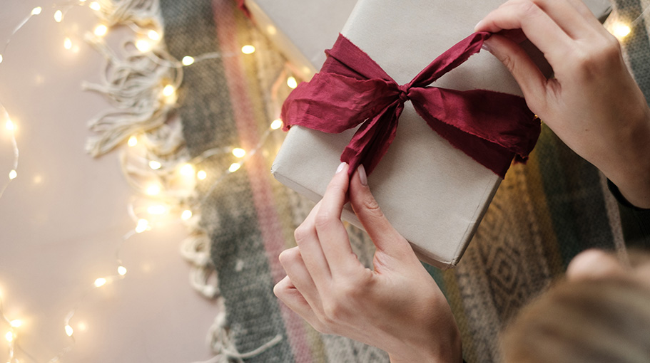 girlfriend opening gift for holidays